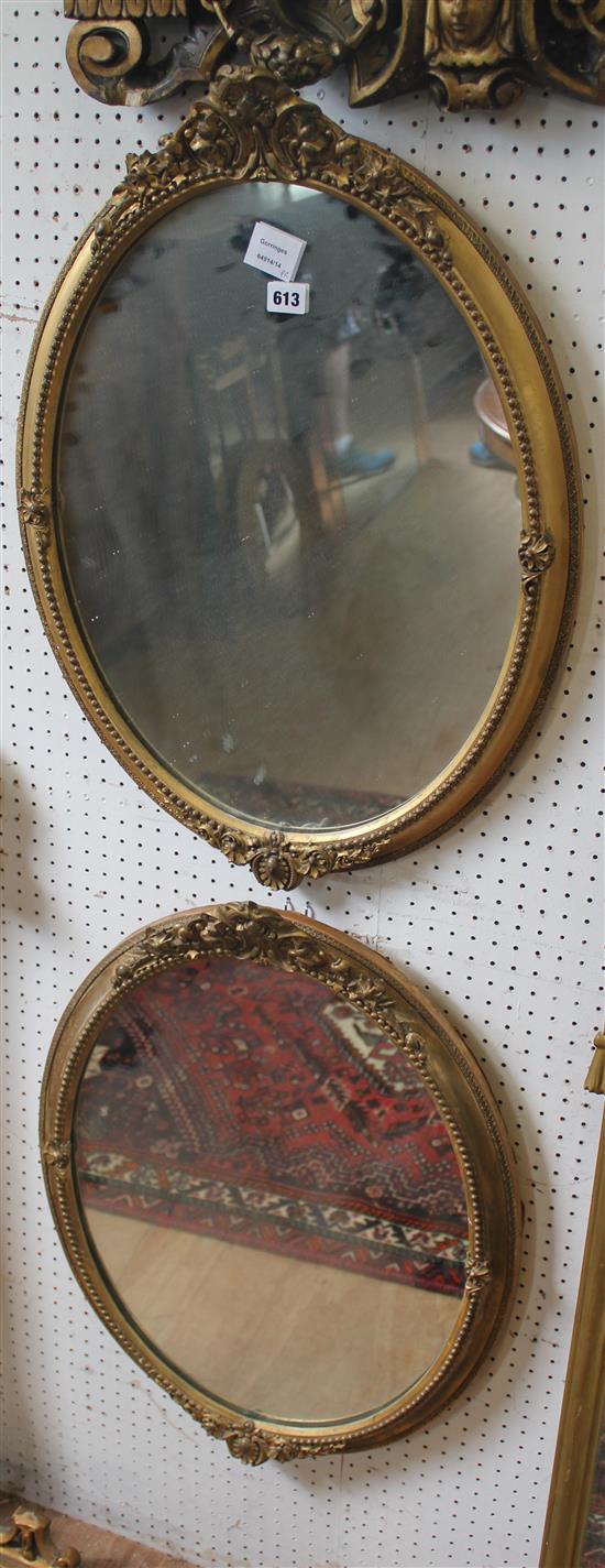 Pair gilt oval mirrors